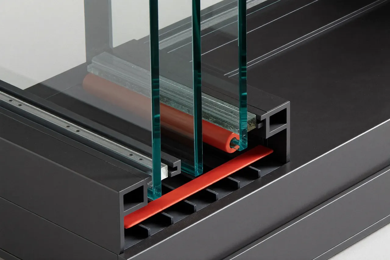 Cut-through of a quality sealed unit showing coated glass and warm-edge spacer